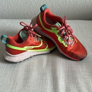 Bright orange/red with yellow and green